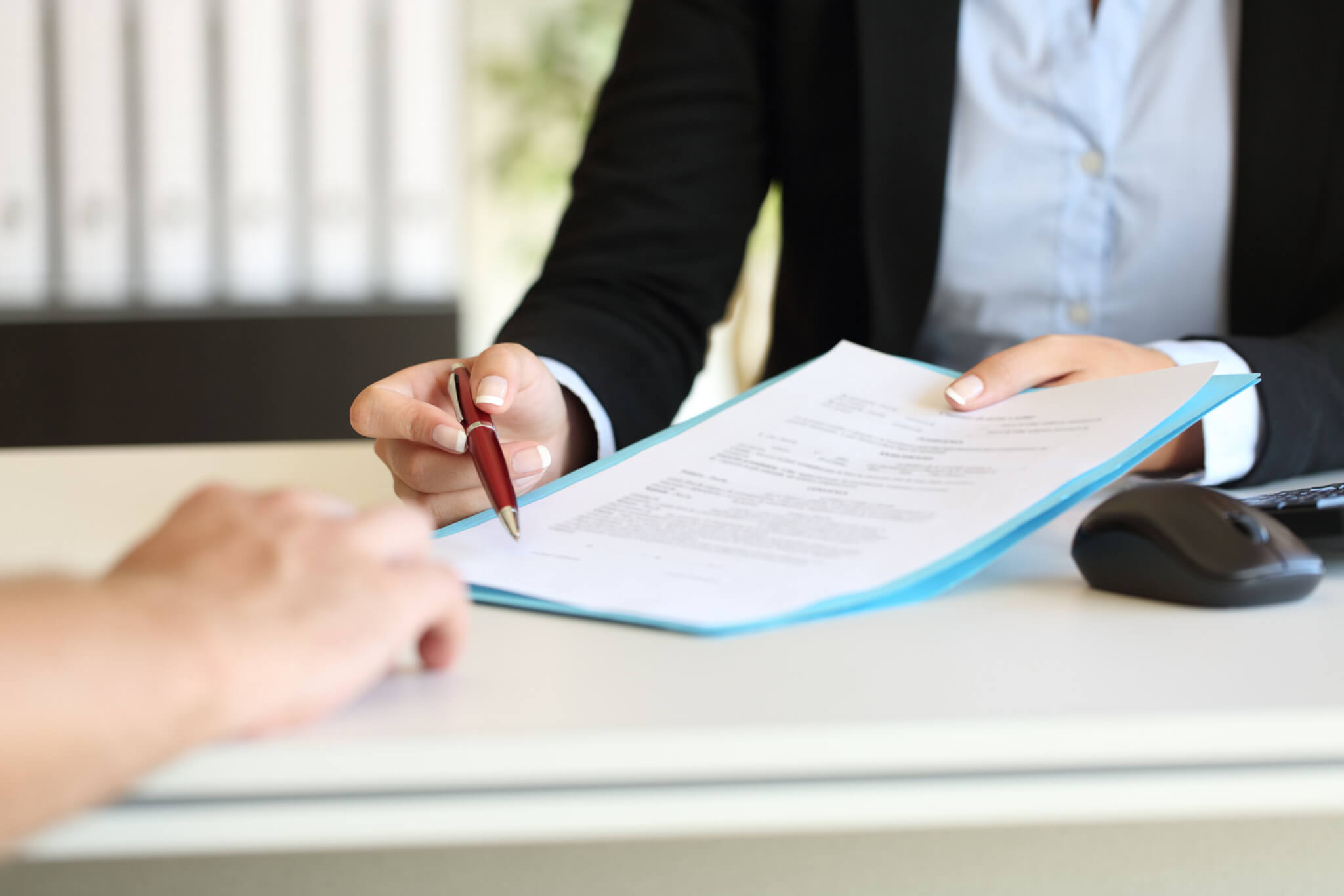 Premises liability lawyer sitting with client