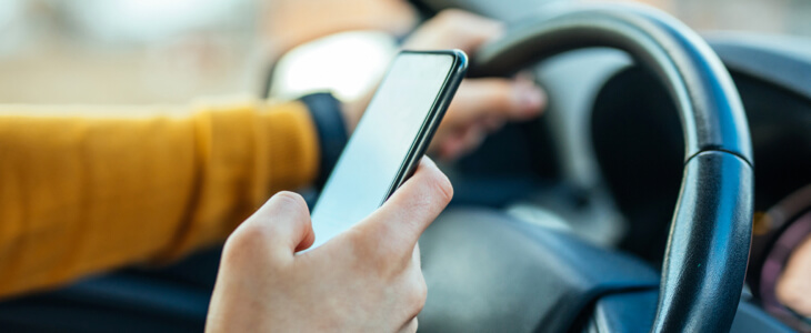 Driver looking at cell phone