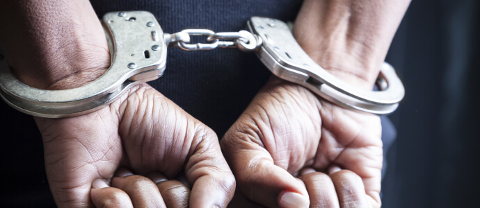 Man in handcuffs for DWI