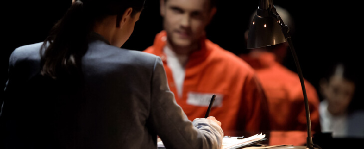 attorney speaking with prison inmate