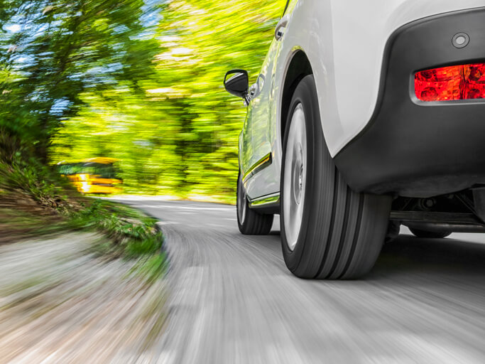 Car driving down the road
