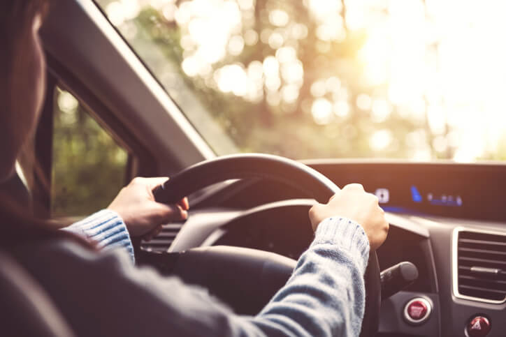 Person driving a car